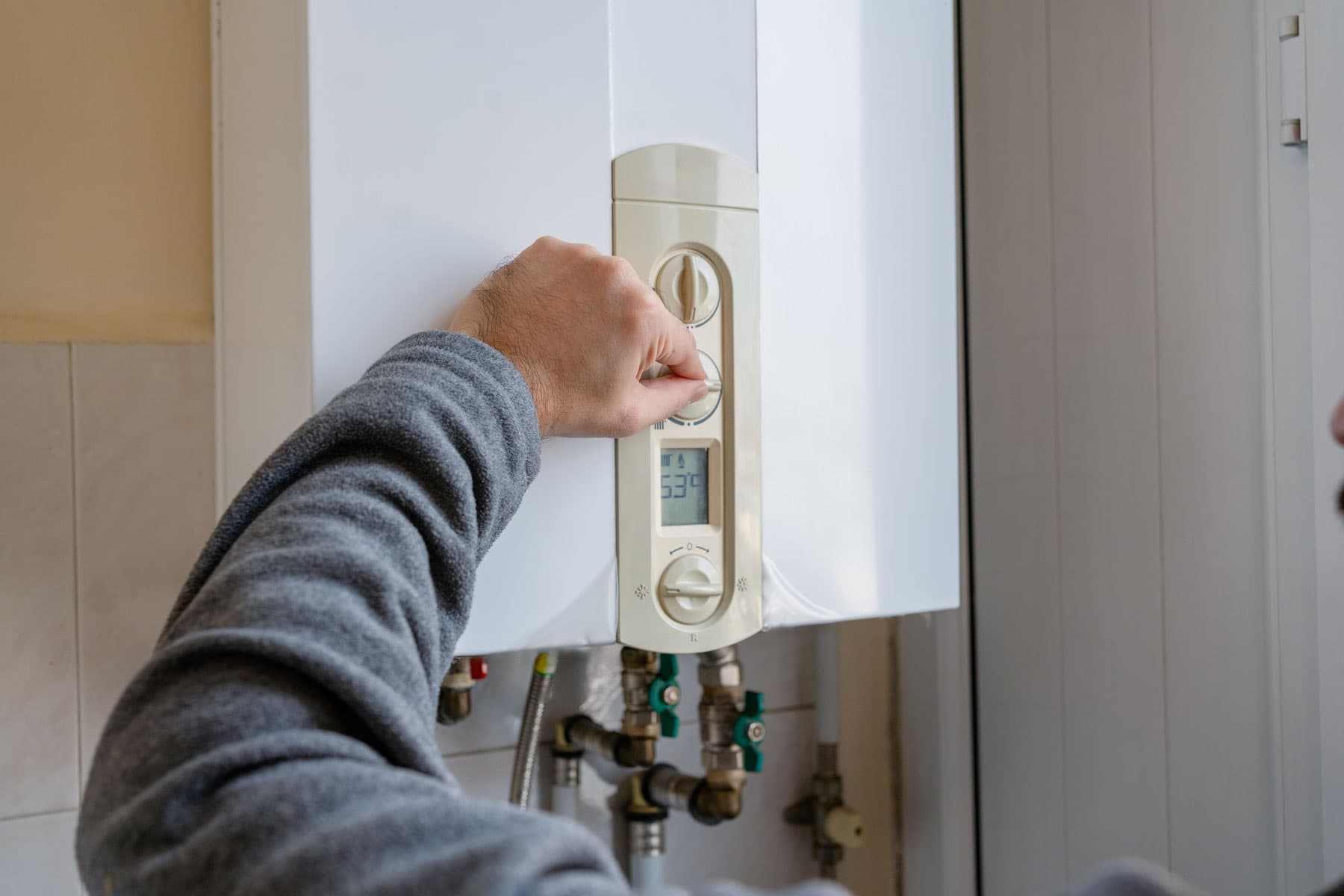 Surrey Boiler Pros technician servicing a boiler